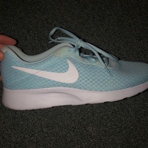 Baby blue nike running shoes